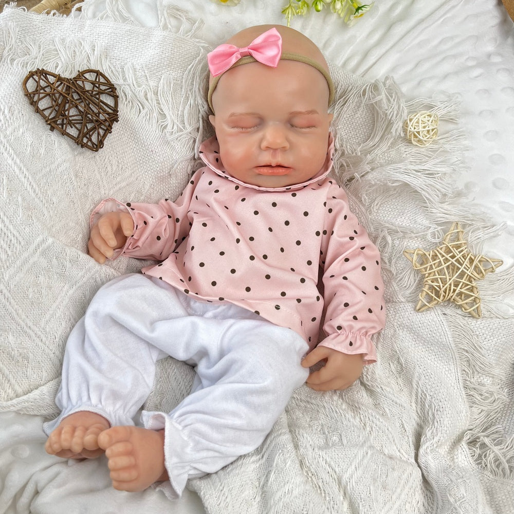 45 cm dehnbare Loulou Reborn Puppe aus Vollsilikon schlafend in rosa gepunktetem Outfit