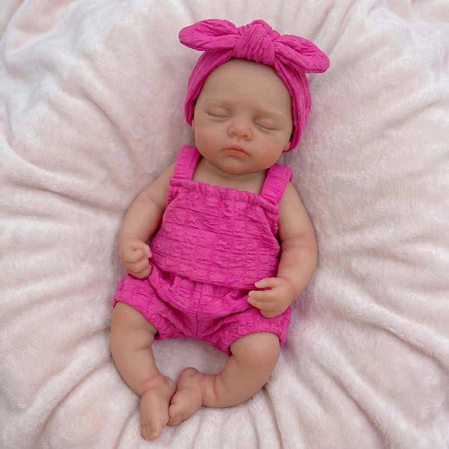 30 cm realistische Irys Reborn-Puppe aus Vollsilikon mit geschlossenen Augen in rosafarbenen Outfits