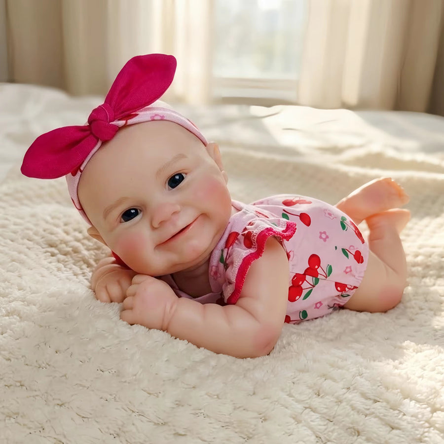 30cm Maddie Smile Reborn Babypuppe aus Vollsilikon im rosa Kirsch-Outfit
