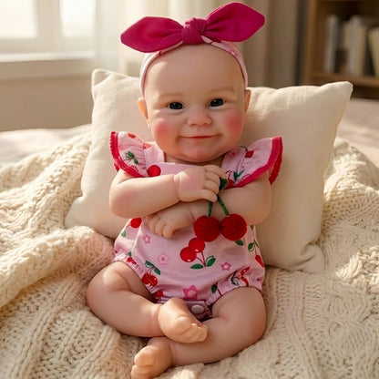 30cm Maddie Smile Reborn Babypuppe aus Vollsilikon im rosa Kirsch-Outfit
