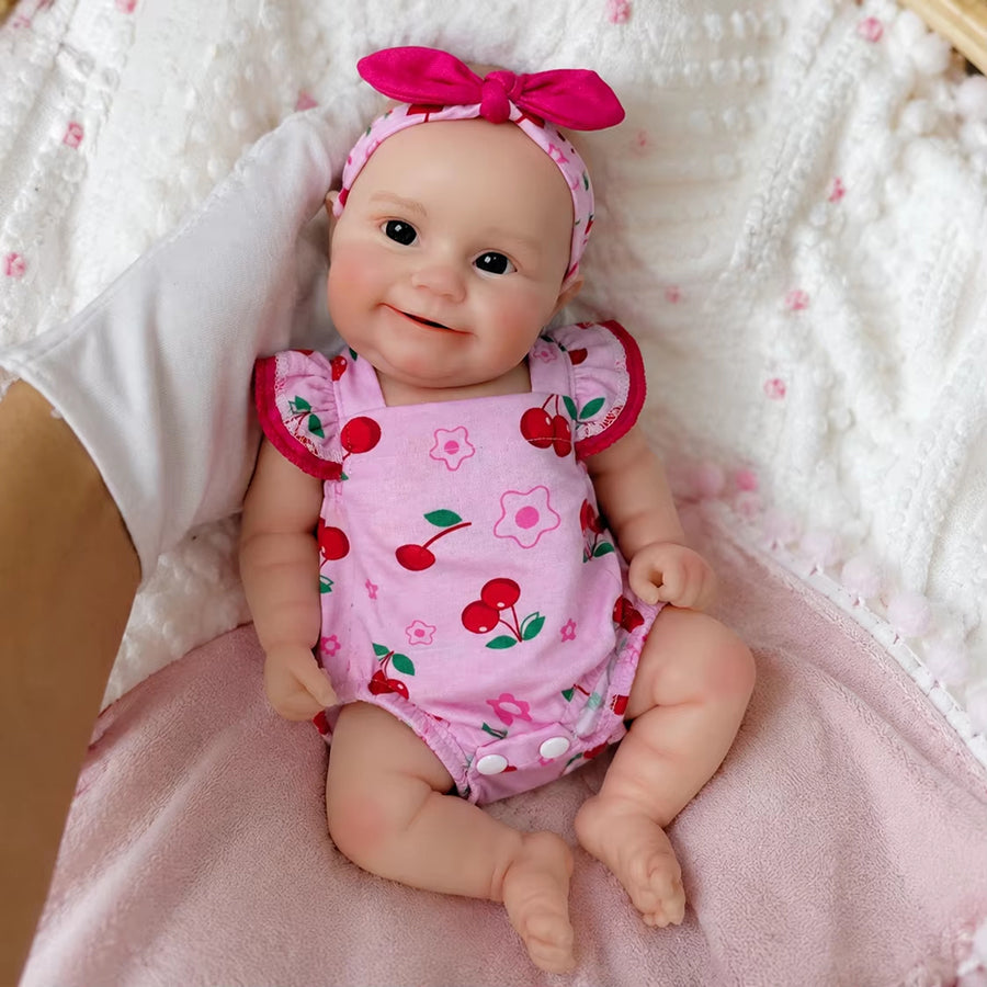 30cm Maddie Smile Reborn Babypuppe aus Vollsilikon im rosa Kirsch-Outfit