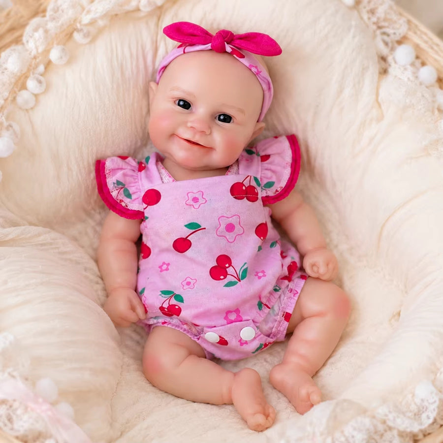 30cm Maddie Smile Reborn Babypuppe aus Vollsilikon im rosa Kirsch-Outfit