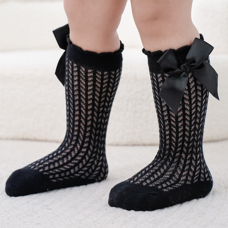 Oberschenkelhohe Netzsocken mit großer Schleife für Kinder