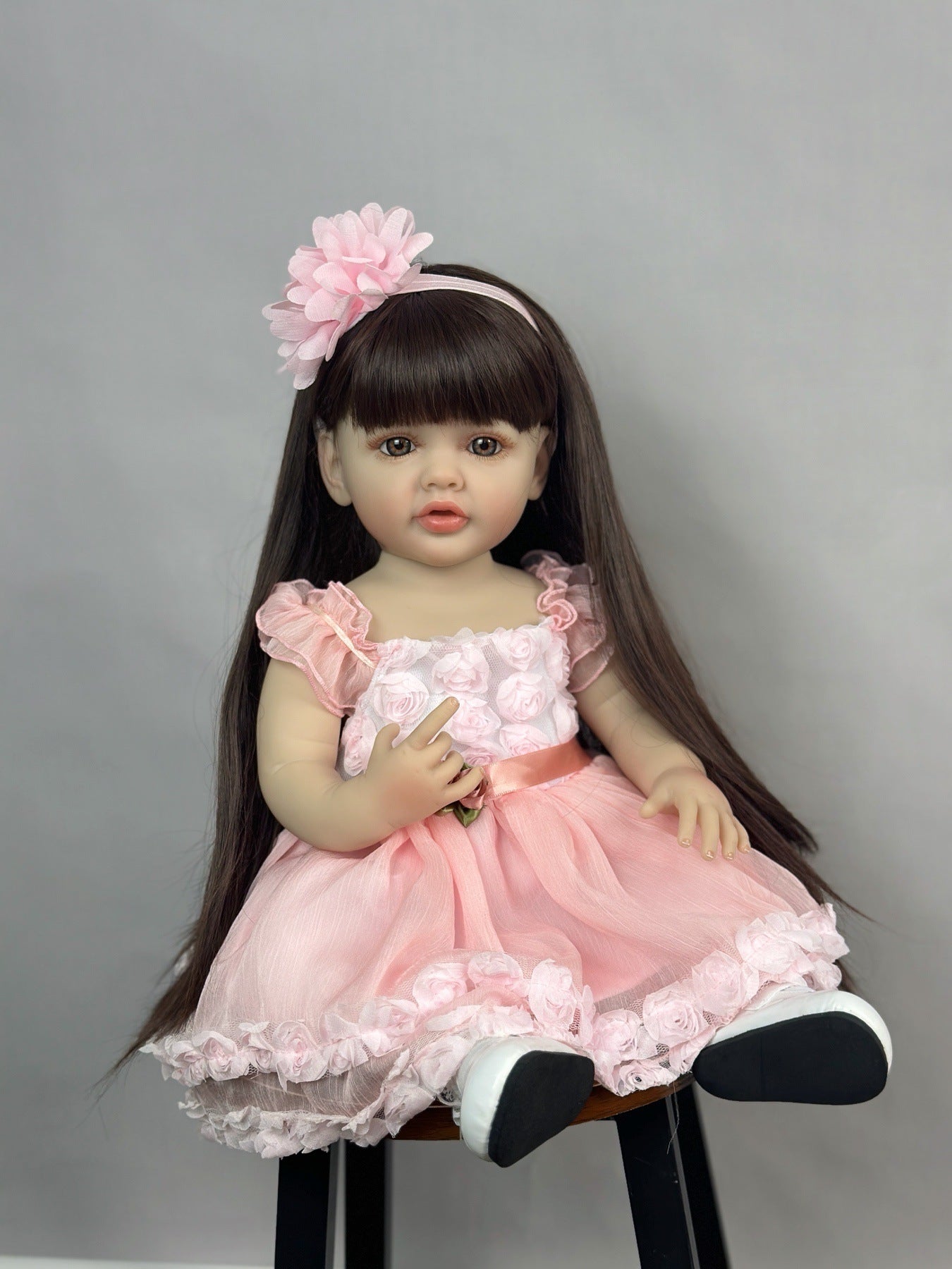 22 Zoll langes braunes Haar Reborn Puppe Mädchen im rosa Kleid-Betty