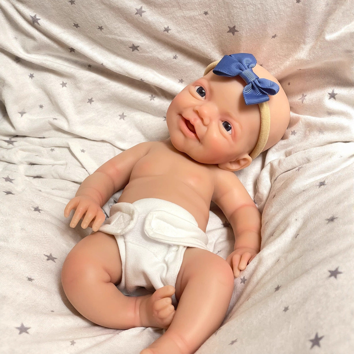 30cm lebensechte Reborn-Puppe mit blauem Lächeln und Vollsilikonaugen - Charlie