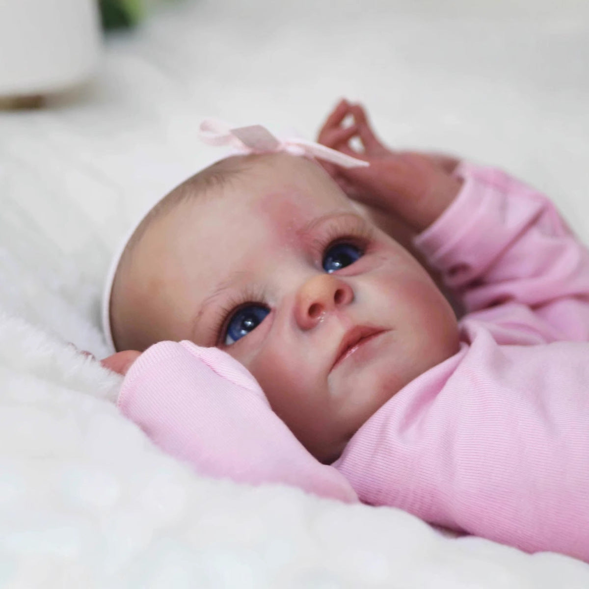 40 cm realistische Reborn-Puppe mit offenen Augen Tink in rosa Kleidung