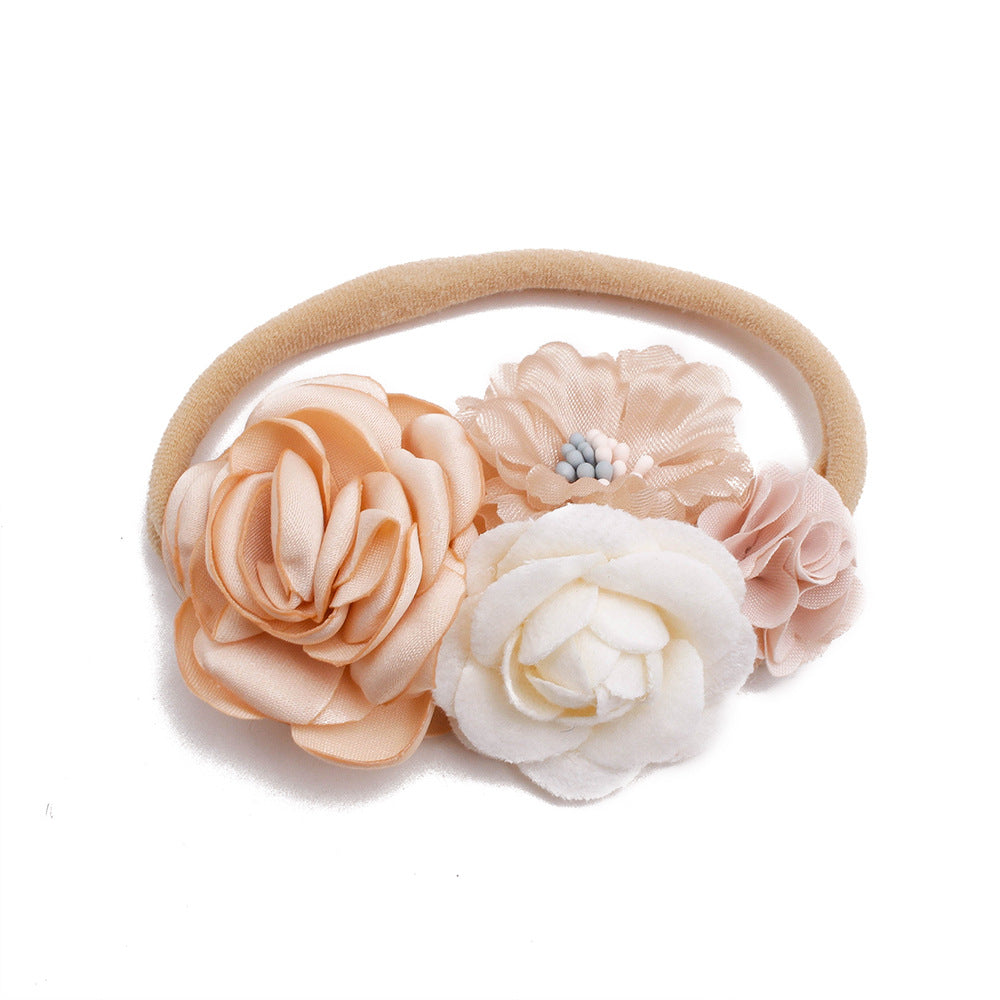 Pastoral elastisches Nylon-Blumen-Baby-Stirnband