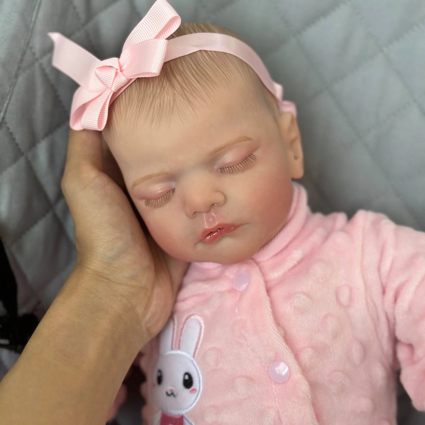 48 cm lebensechte Sam-Reborn Puppe mit weichem Körper in rosa Kleidung