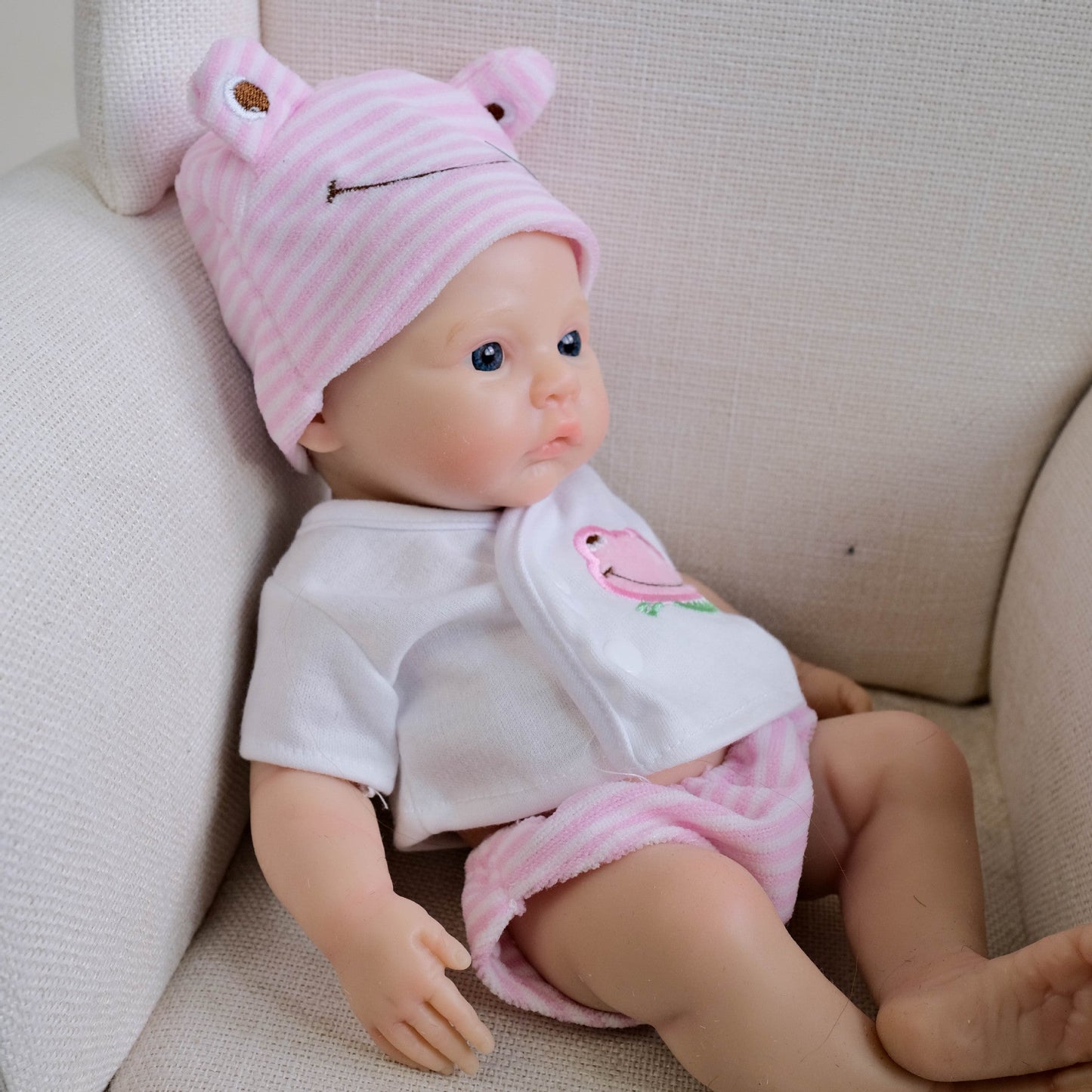 30 cm weiches Silikon-Reborn-Baby Mädchen mit blauen Augen und rosa Kleidung