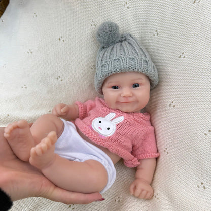 30 cm vollständig aus Silikon gefertigte Reborn-Babypuppe Maddie in rosa Kleidung