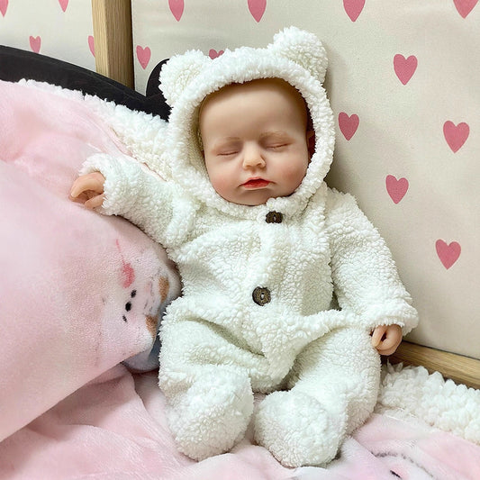 30 cm lebensechte Reborn-Puppe aus Vollsilikon mit geschlossenen Augen Mädchen in weißer Plüschkleidung