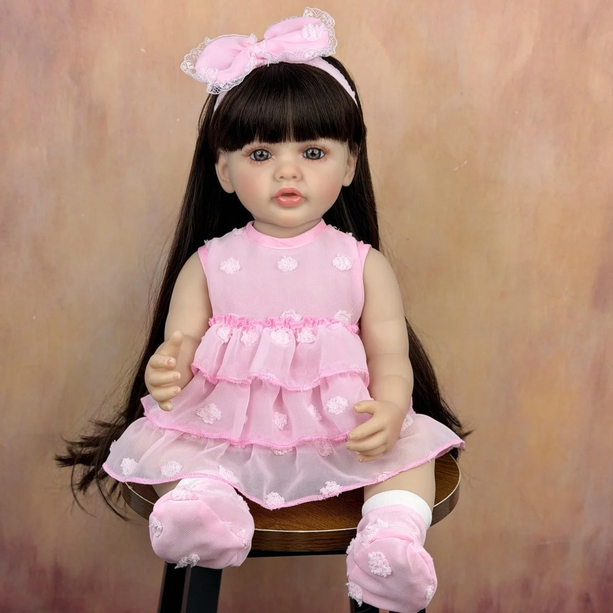 55 cm langes Haar Betty Reborn-Baby Mädchen im rosa Kleid