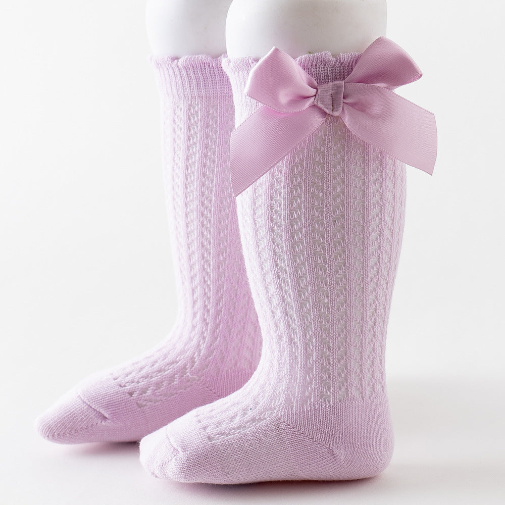Oberschenkelhohe Netzsocken mit großer Schleife für Kinder