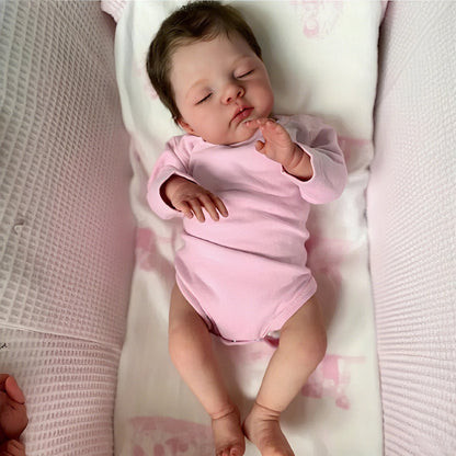 45 cm lebensechte Reborn-Puppe Irys mit weichem Körper geschlossenen Augen und rosa Kleidung