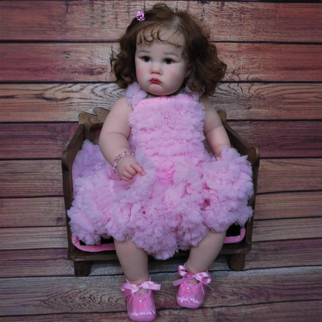 60 cm Reborn-Puppe mit offenen Augen und braunem Haar Charlotte im rosa Kleid