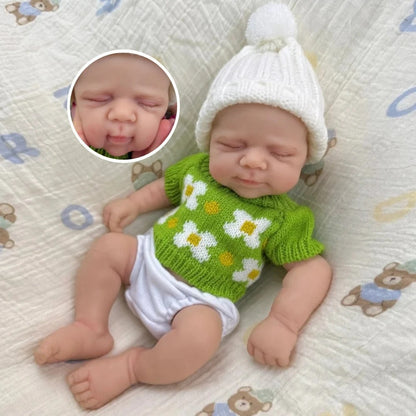 30 cm schlafende Pascale Reborn Puppe aus Vollsilikon in grünem Strickoutfit