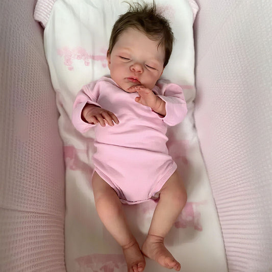 45 cm lebensechte Reborn-Puppe Irys mit weichem Körper geschlossenen Augen und rosa Kleidung
