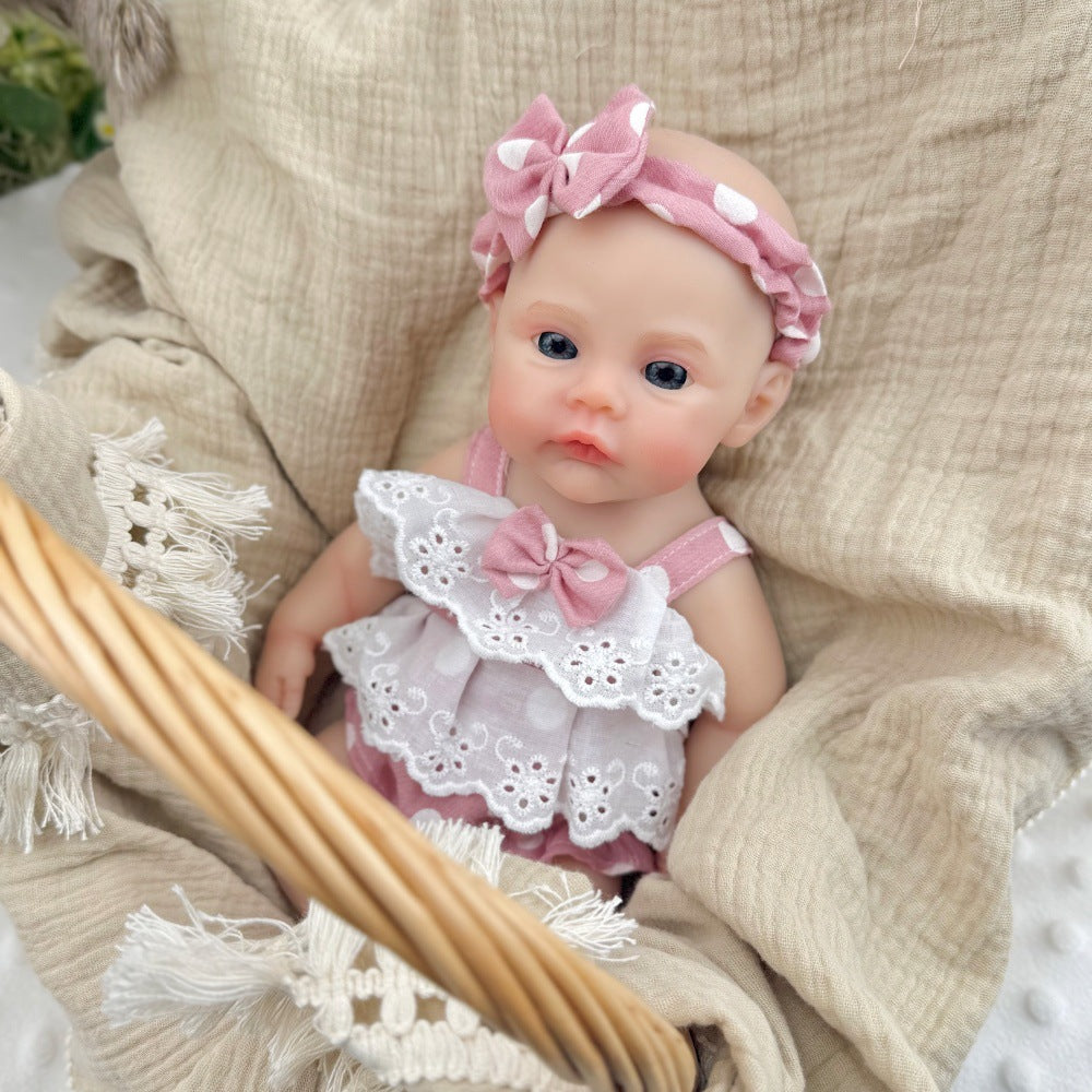 30 cm vollständig aus Silikon gefertigtes Reborn-Baby Meadow Mädchen mit rosa gepunkteter Kleidung