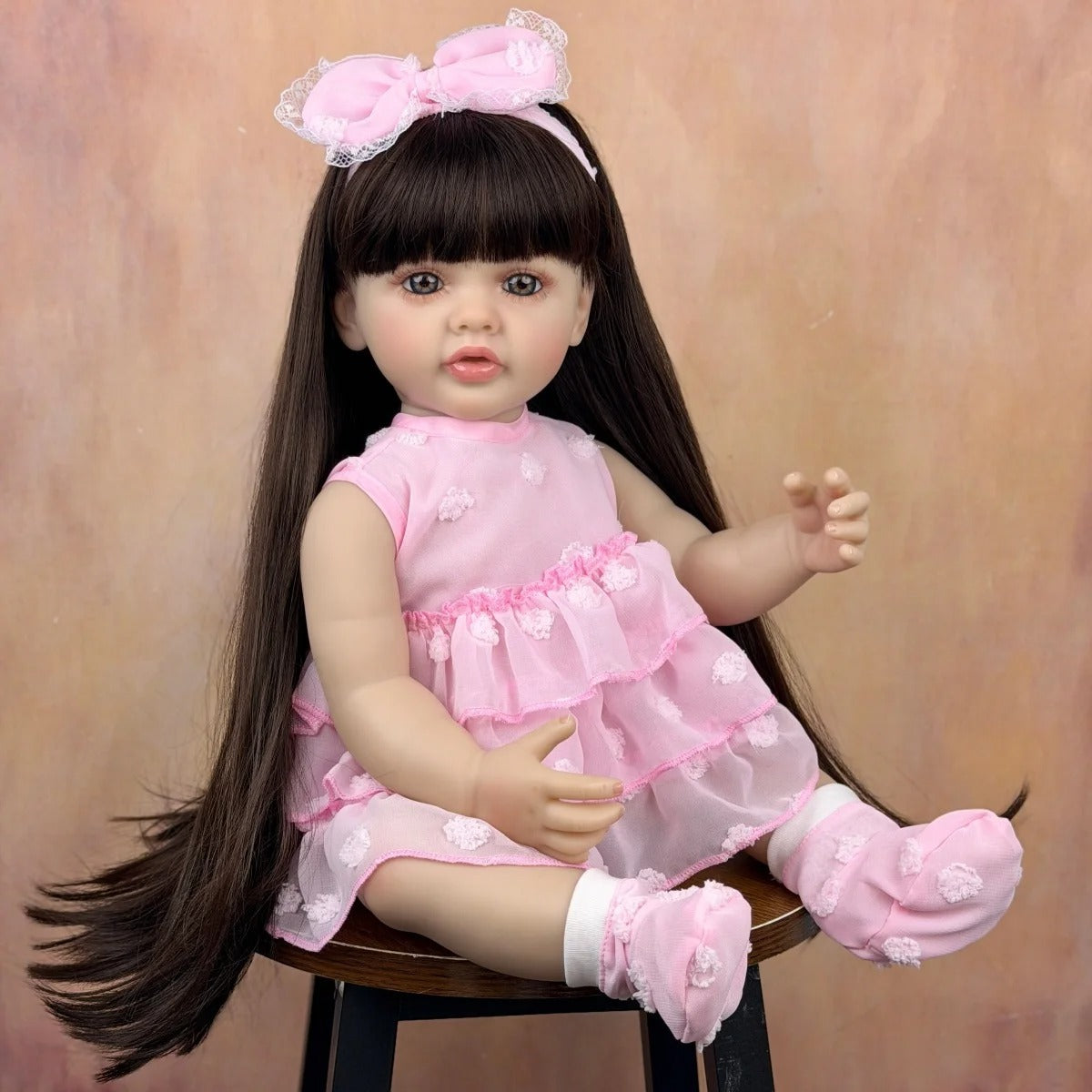 55 cm langes Haar Betty Reborn-Baby Mädchen im rosa Kleid