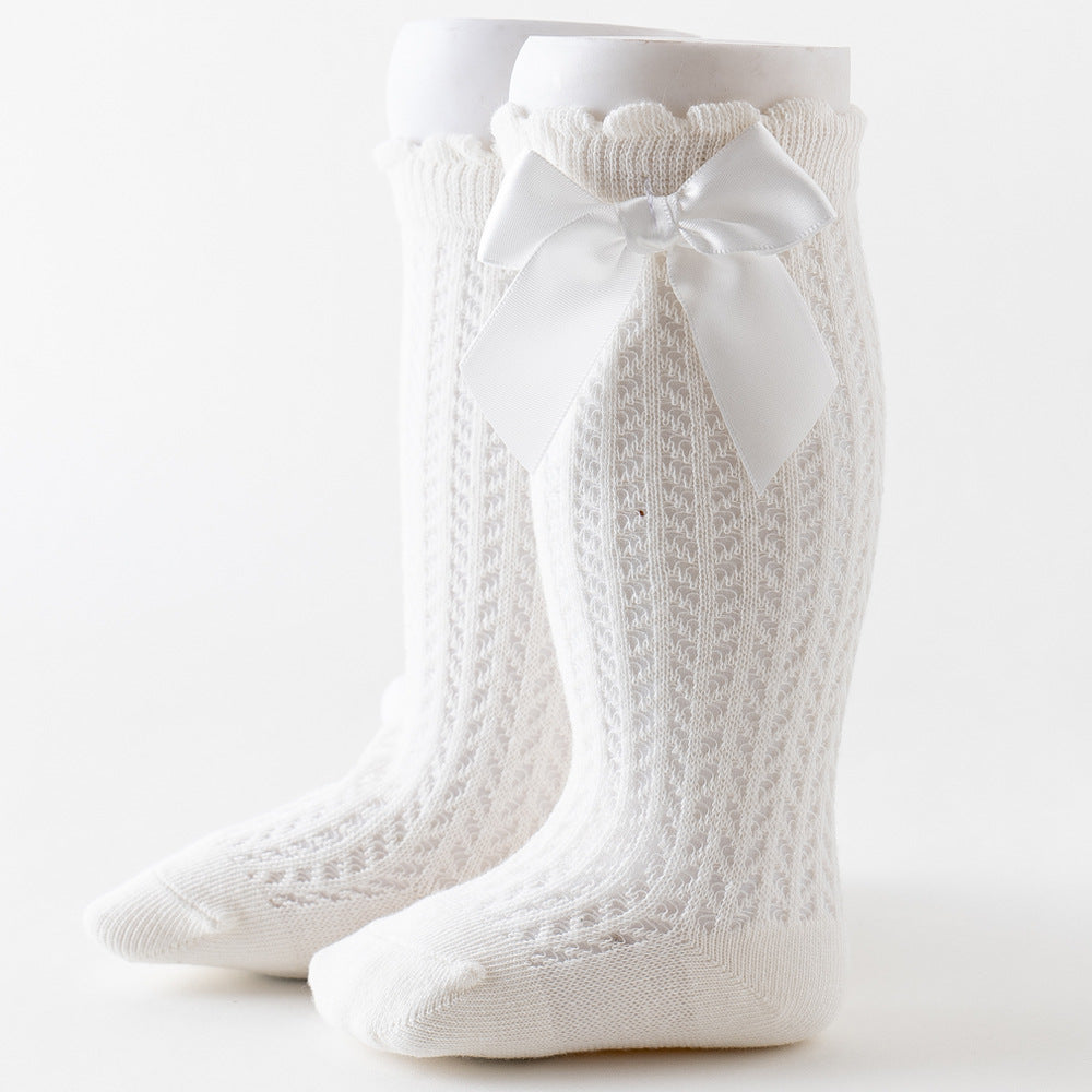 Oberschenkelhohe Netzsocken mit großer Schleife für Kinder