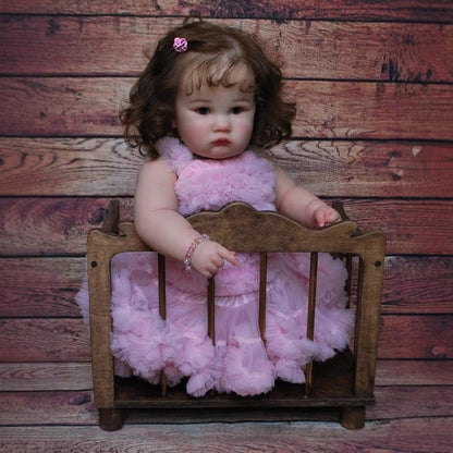 60 cm Reborn-Puppe mit offenen Augen und braunem Haar Charlotte im rosa Kleid