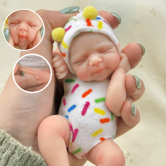 15 cm Silikon Reborn Puppe Pascale mit geschlossenen Augen in weißem Outfit