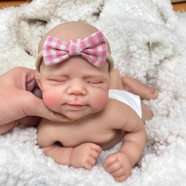 30cm lebensechte Reborn-Puppe Pascale aus Vollsilikon mit geschlossenen Augen