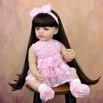 55 cm langes Haar Betty Reborn-Baby Mädchen im rosa Kleid