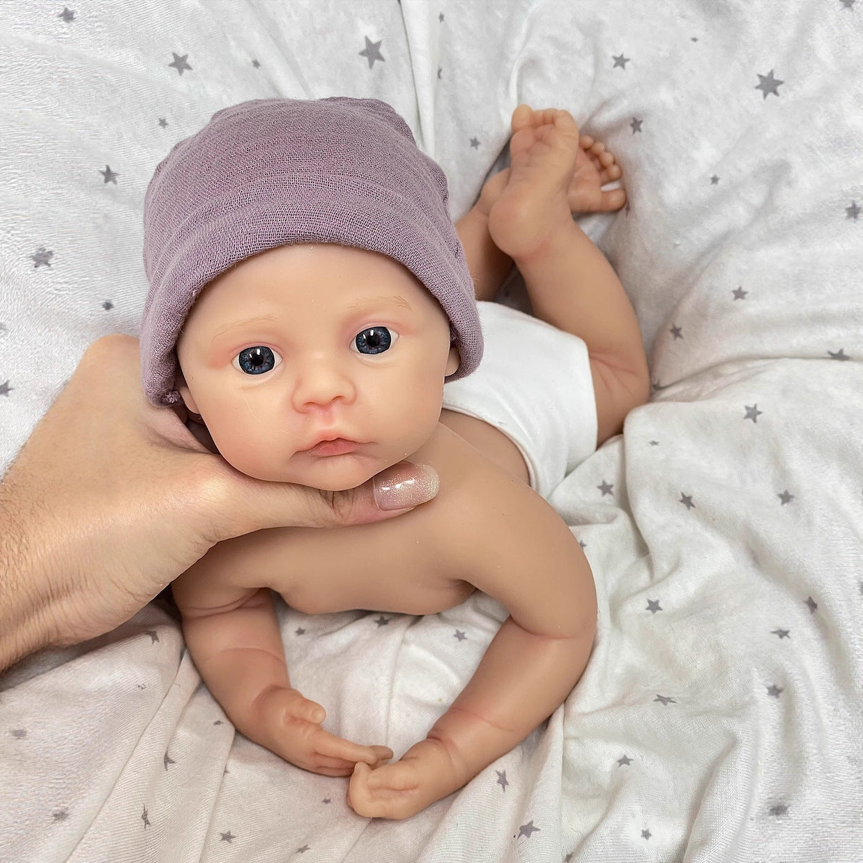 30cm weiches Silikon-Reborn-Baby-Mädchen mit blauen Augen und lila Kleidung - Meadow