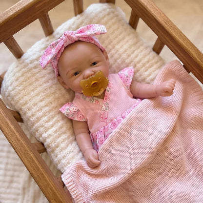 20cm Vivienne Reborn Puppe aus Vollsilikon im rosa geblümten Kleid