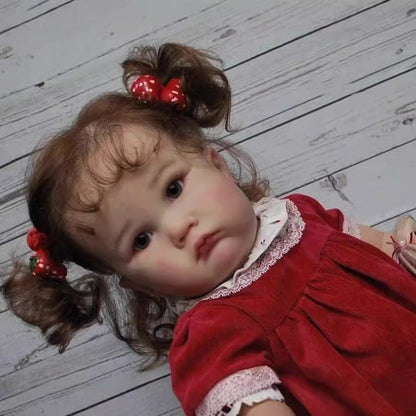 Stella 60cm Reborn Puppe mit blauen Augen und rotem Kleid
