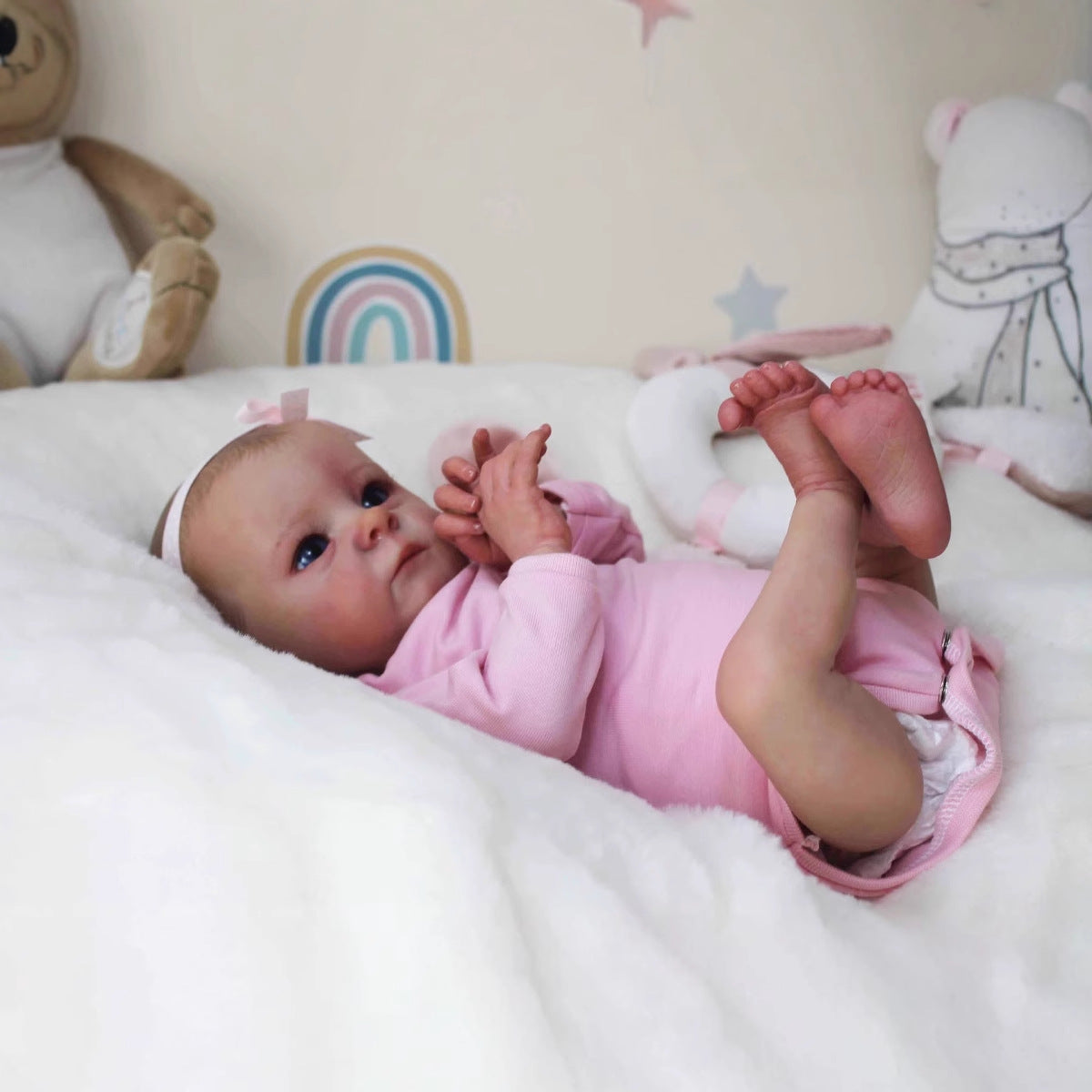 40 cm realistische Reborn-Puppe mit offenen Augen Tink in rosa Kleidung