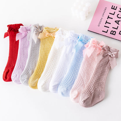 Oberschenkelhohe Netzsocken mit großer Schleife für Kinder