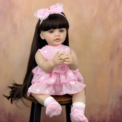55 cm langes Haar Betty Reborn-Baby Mädchen im rosa Kleid