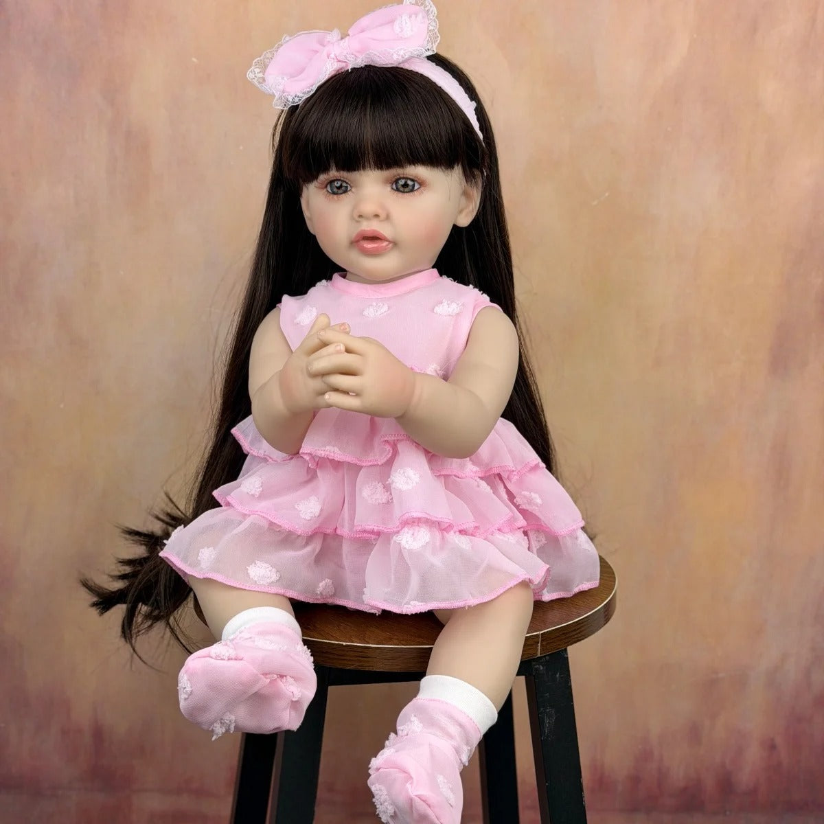 55 cm langes Haar Betty Reborn-Baby Mädchen im rosa Kleid