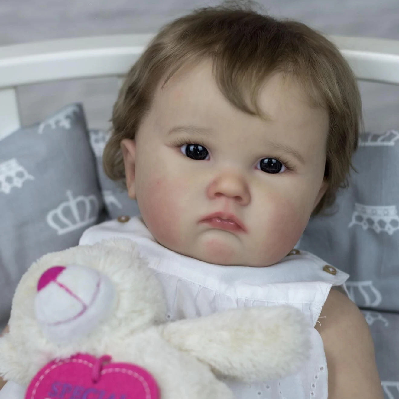 Cheryl 60cm Reborn-Puppe mit blauen Augen und braunen Haaren