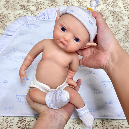 30 cm lebensechte Reborn-Puppe aus Vollsilikon mit geschlossenen Augen und Elfenohren