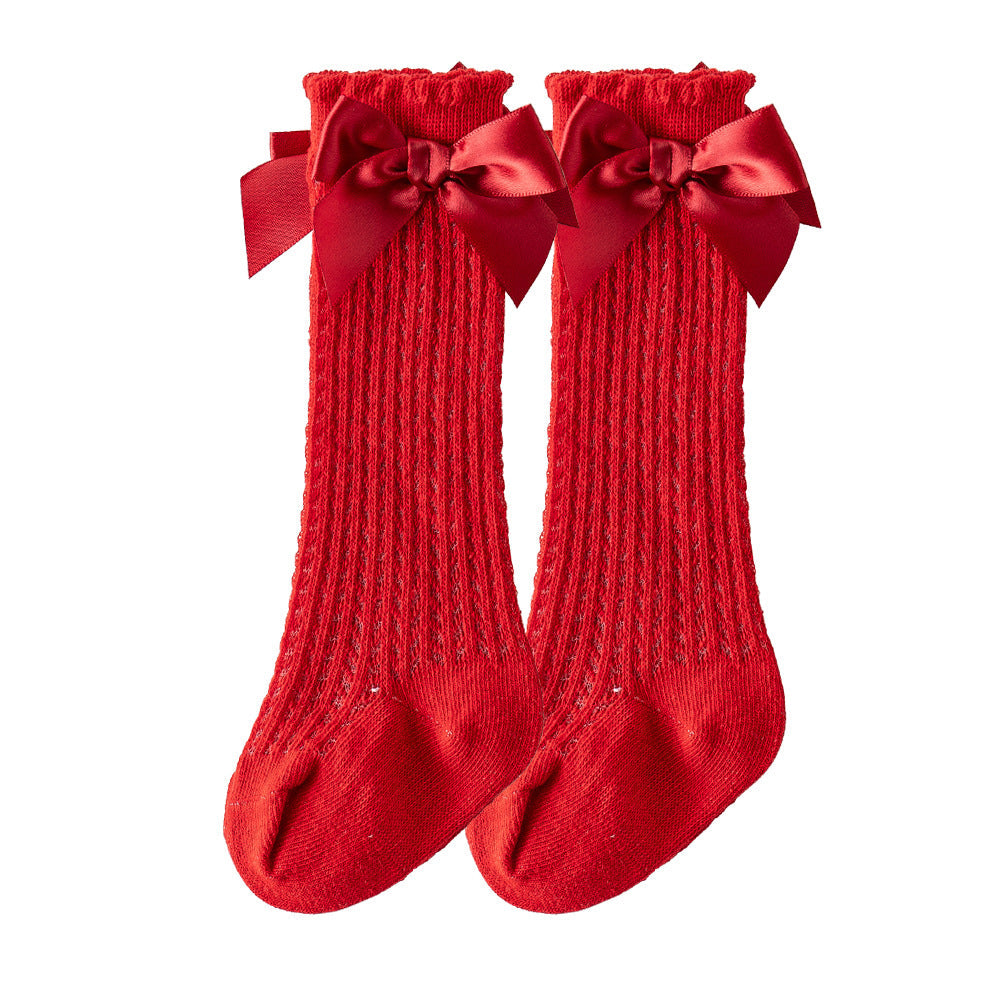 Oberschenkelhohe Netzsocken mit großer Schleife für Kinder
