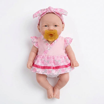 20cm Vivienne Reborn Puppe aus Vollsilikon im rosa geblümten Kleid