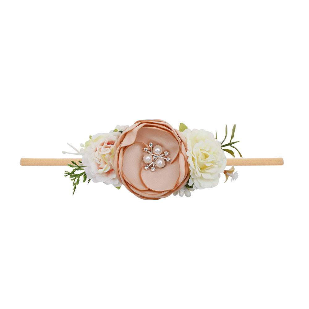 Pastoral elastisches Nylon-Blumen-Baby-Stirnband