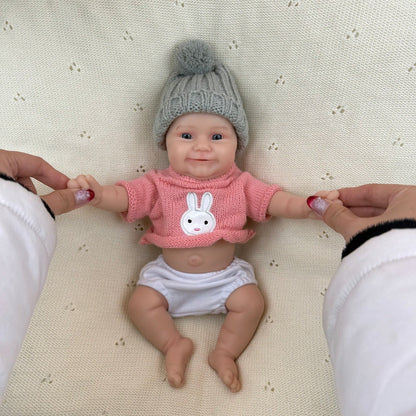 30 cm vollständig aus Silikon gefertigte Reborn-Babypuppe Maddie in rosa Kleidung
