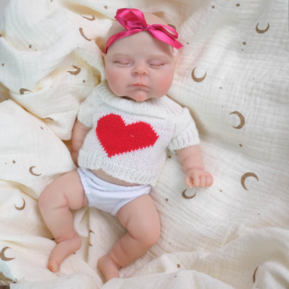 30 cm weiches Silikon-Reborn-Baby-Mädchen mit geschlossenen Augen Pfirsichfarben in weißer Kleidung