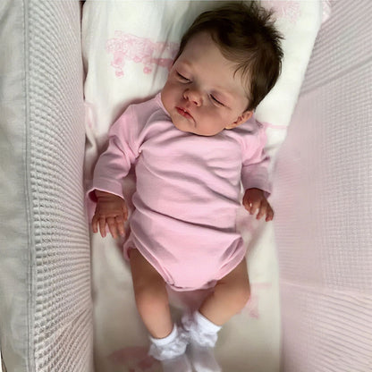 45 cm lebensechte Reborn-Puppe Irys mit weichem Körper geschlossenen Augen und rosa Kleidung