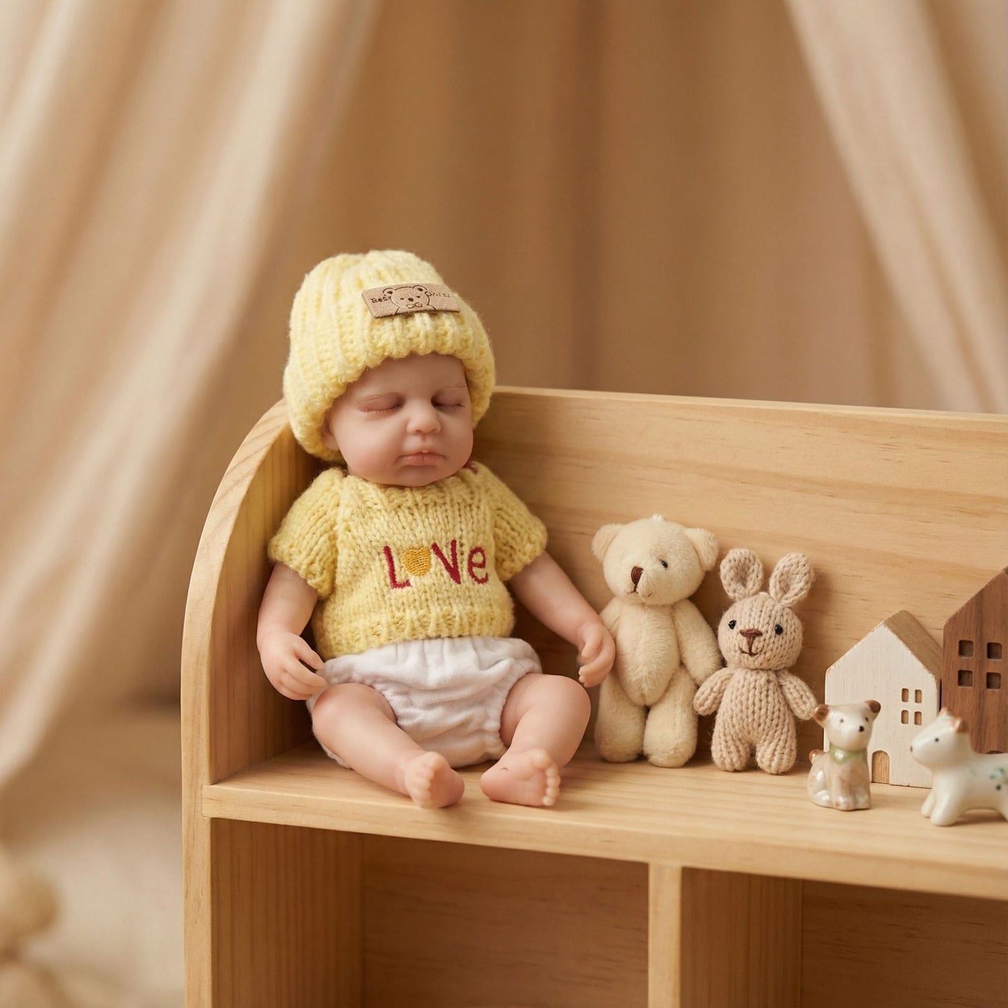 20 cm Loulou Reborn-Babypuppe aus Vollsilikon im gelben Pullover