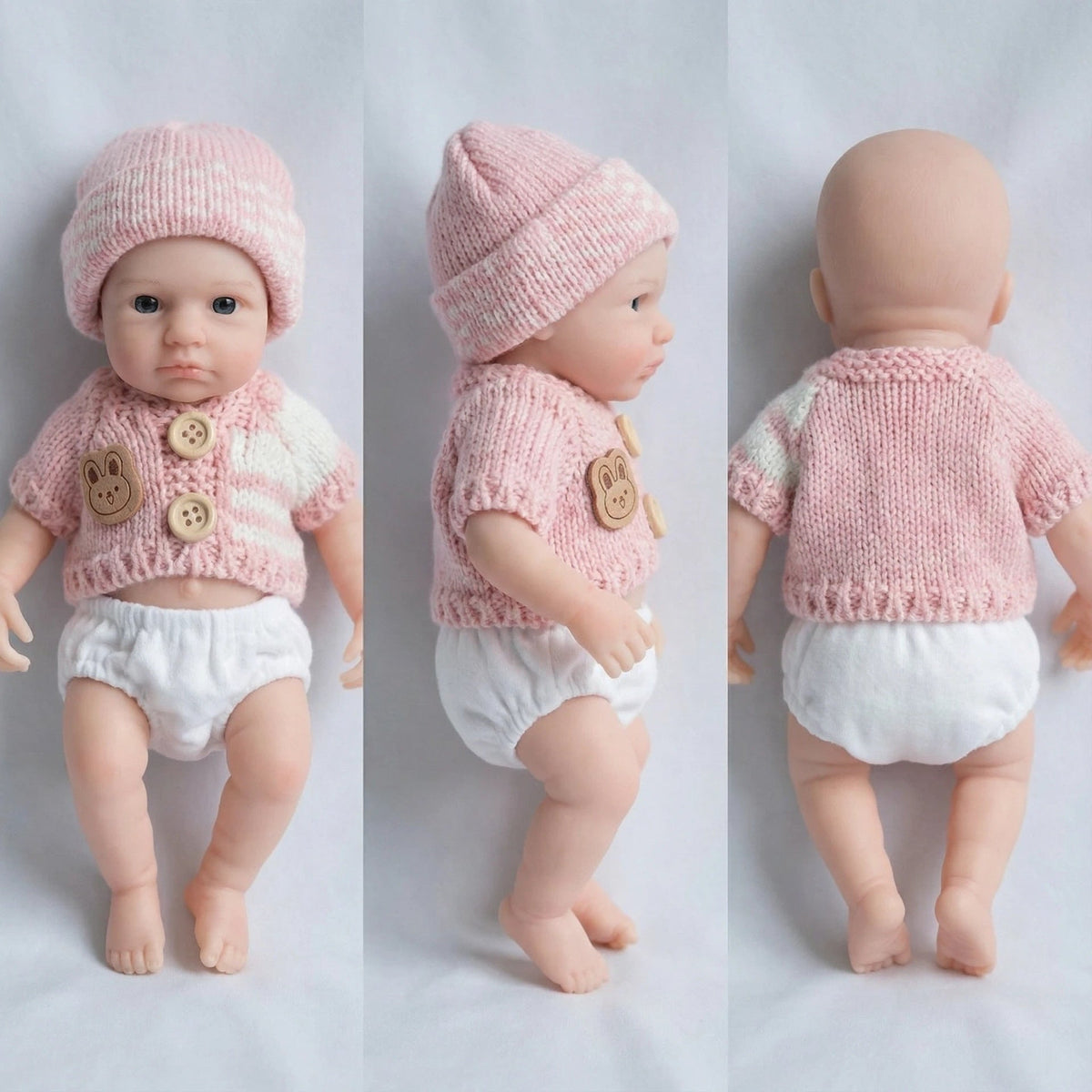 20 cm Loulou Reborn-Babypuppe aus Vollsilikon mit offenen Augen im rosa Pullover