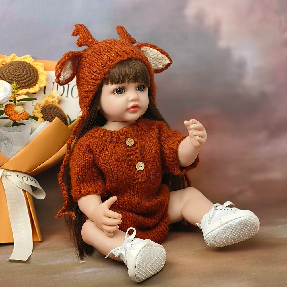 55 cm offene Augen langes Haar Betty Reborn Puppen Mädchen in brauner Strickware