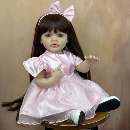 55 cm lebensecht wirkendes Betty-Reborn Babymädchen mit langen Haaren im rosa Kleid