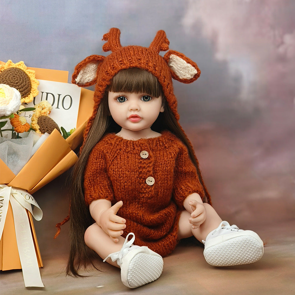 55 cm offene Augen langes Haar Betty Reborn Puppen Mädchen in brauner Strickware