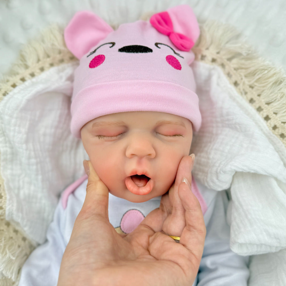 45 cm dehnbare Loulou Reborn Puppe aus Vollsilikon im rosa Bärenoutfit