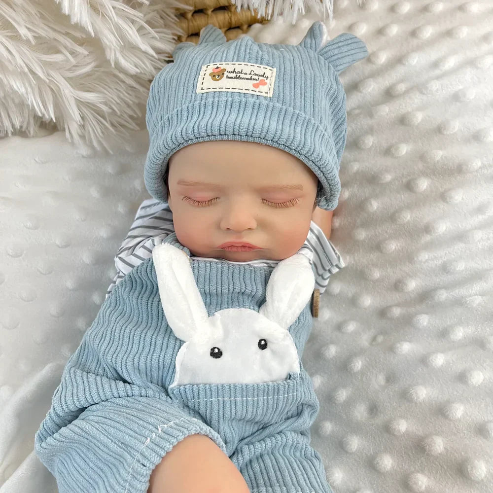 20 Zoll 3D-bemalte Rosalie Reborn Puppe schlafend in blauen Hasenoutfits